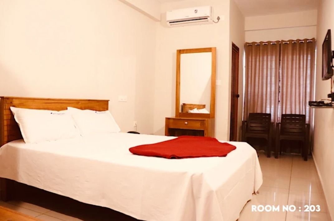 Residancy in Thalassery, rooms in thalassery, lodge in thalassery 