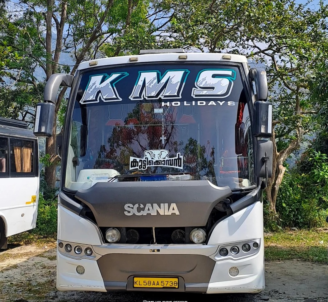 Tourist bus thalassery, traveller Thalassery, KMS Holidays 