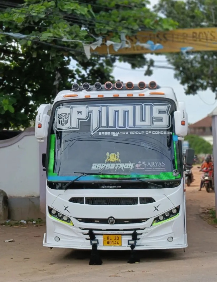 Tourist bus kollam paravoor, tourist bus service kollam paravoor, Optimus Travelvibes 