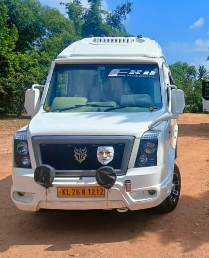 Tourist Bus Adoor,Traveller Adoor,Tourist Bus Service Adoor Pathanamthitta,ERA Holidays  