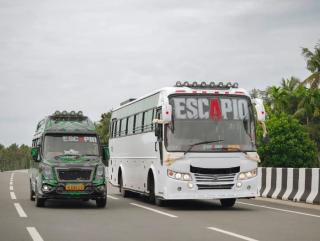 Tourist bus service in kollam ernakulam,Traveller service in kollam ernakulam,Tourist bus booking Traveller booking in kollam ernakulam,Escapio Holidays 