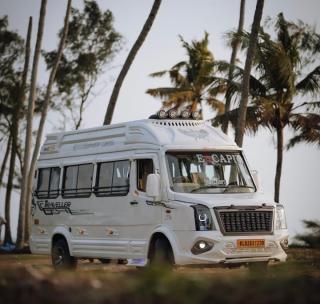 Tourist bus service in kollam ernakulam,Traveller service in kollam ernakulam,Tourist bus booking Traveller booking in kollam ernakulam,Escapio Holidays 