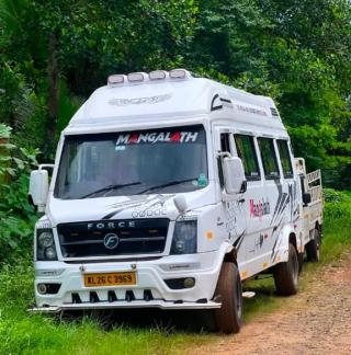 Traveller service in punalur kunnikode,Traveller booking in  punalur kunnikode kollam, Mangalath Travel Hub 