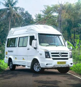Traveller service in perumbavoor muvattupuzha,Traveller booking in perumbavoor muvattupuzha,Triangle Travel Hub 