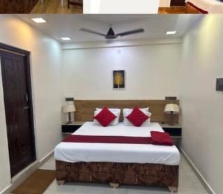 Stay in melmaruvathur ,Hotel room in melmaruvathur ,Banquet hall in melmaruvathur ,SMJ Grand Hotel  