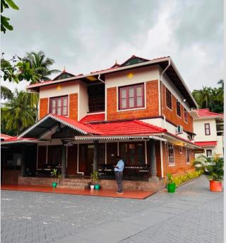 Stay in mattannur kannur,Ayurvedic spa in mattannur kannur,Multi cuisine restaurant in mattannur kannur,Banquet hall in mattannur kannur,Aroma Ayur Heritage
