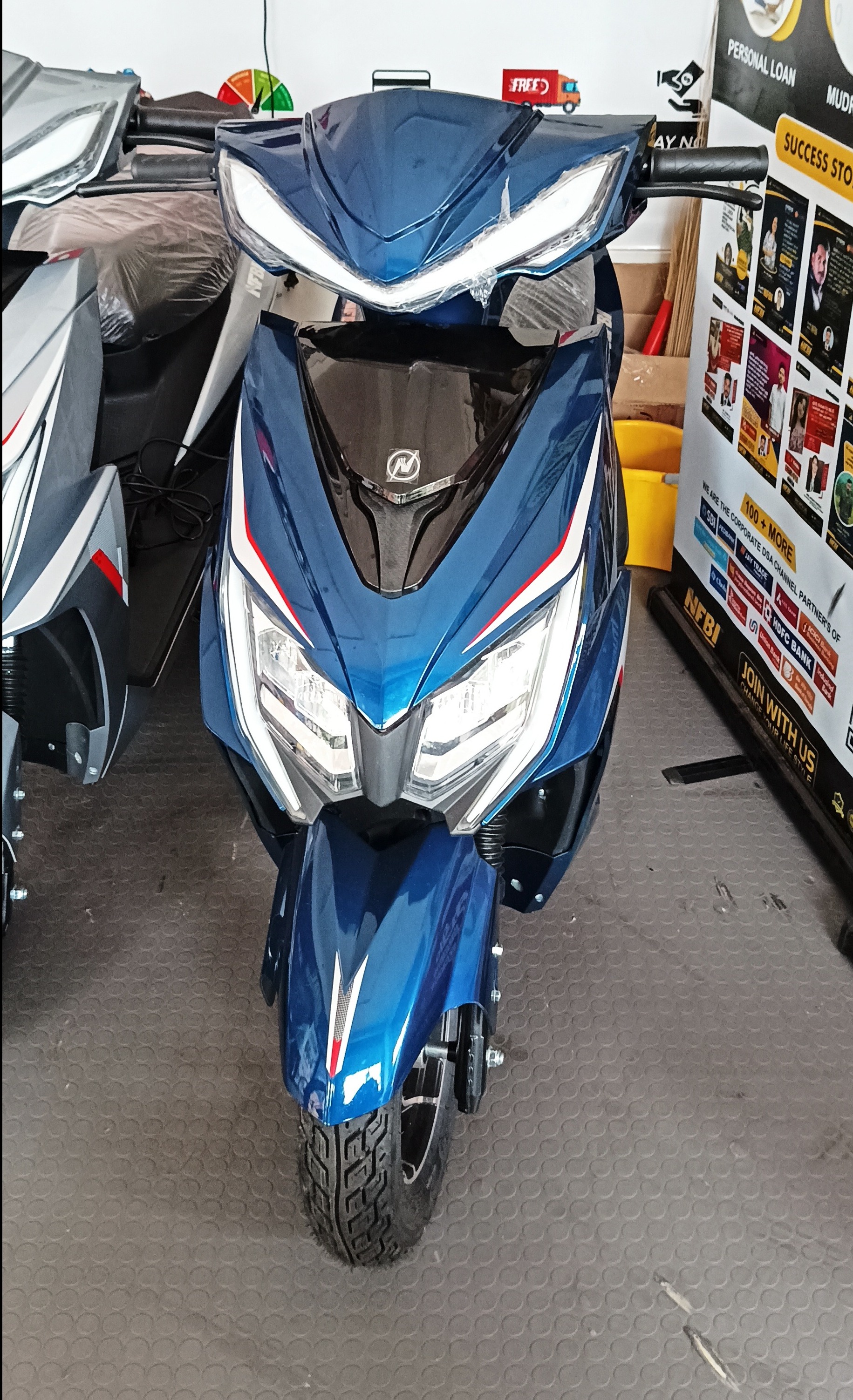 Electric scooter and bicycle Ezdan motors dealership kallachi NFBI