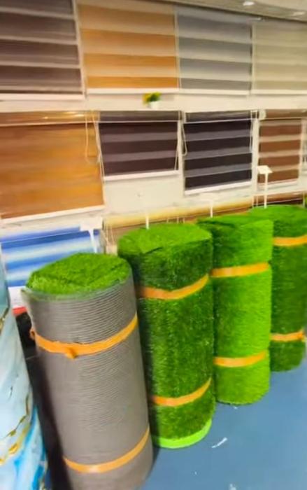 Artificial grass wholesale shop in kollam,vertical garden artificial flower blinds curtains mat carpets  wholesale dealer in kollam,Ria Agencies 