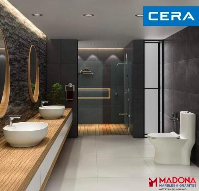Marbles and Granites  showroom in pallom kottayam,tiles sanitaryware bathroom fittings FRP doors pebbles in pallom kottayam,Madona Marbles & Granites 